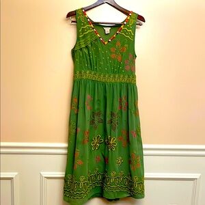 Sundance Kelly green embroidered dress with green liner. Has stain